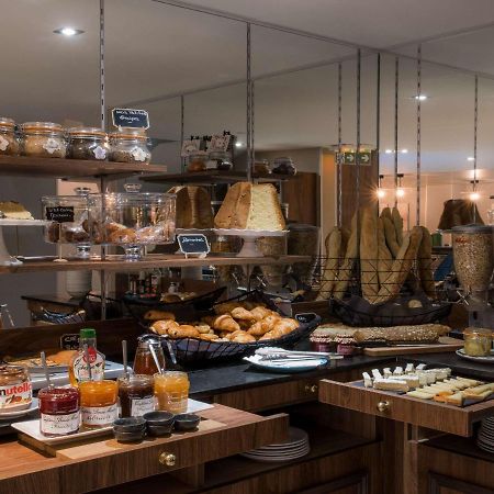 Hotel Mercure Paris Suresnes Longchamp Esterno foto