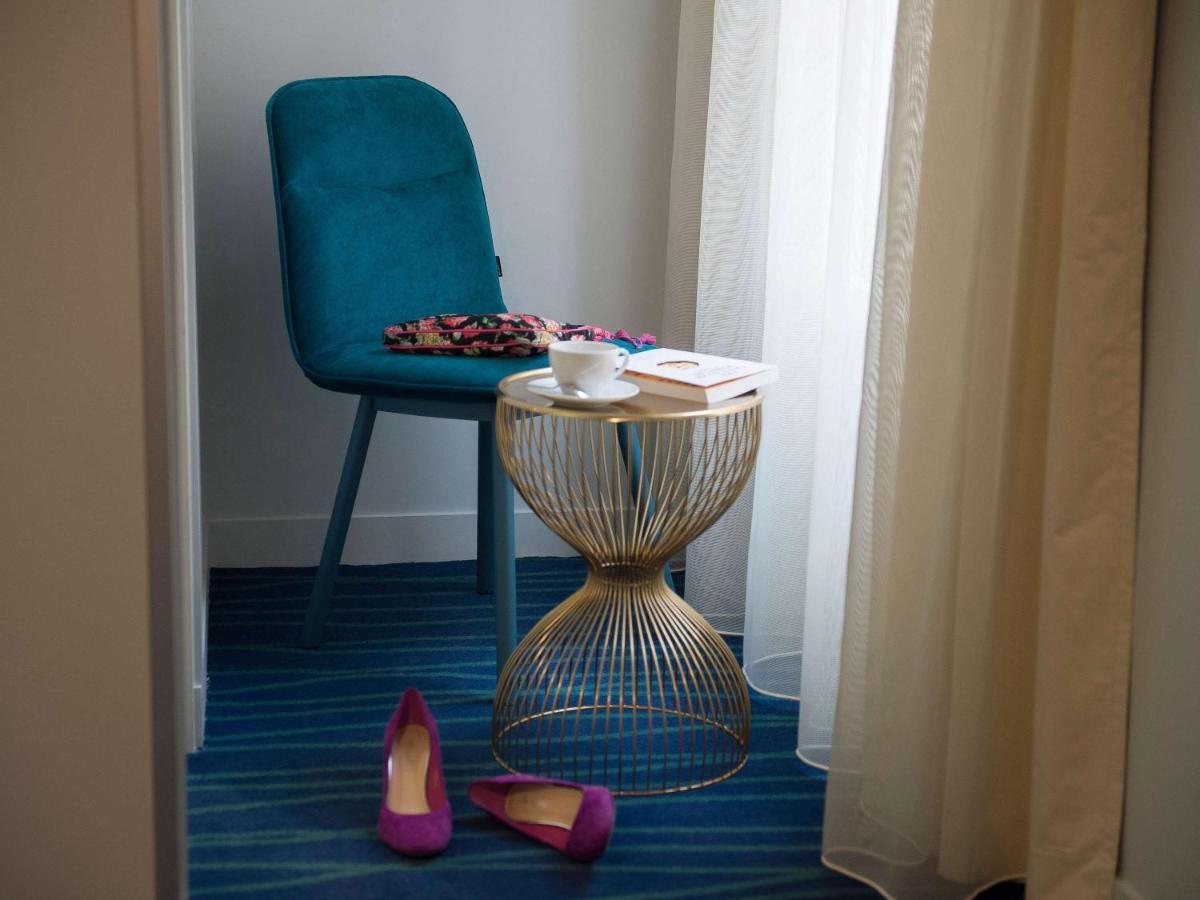 Hotel Mercure Paris Suresnes Longchamp Esterno foto