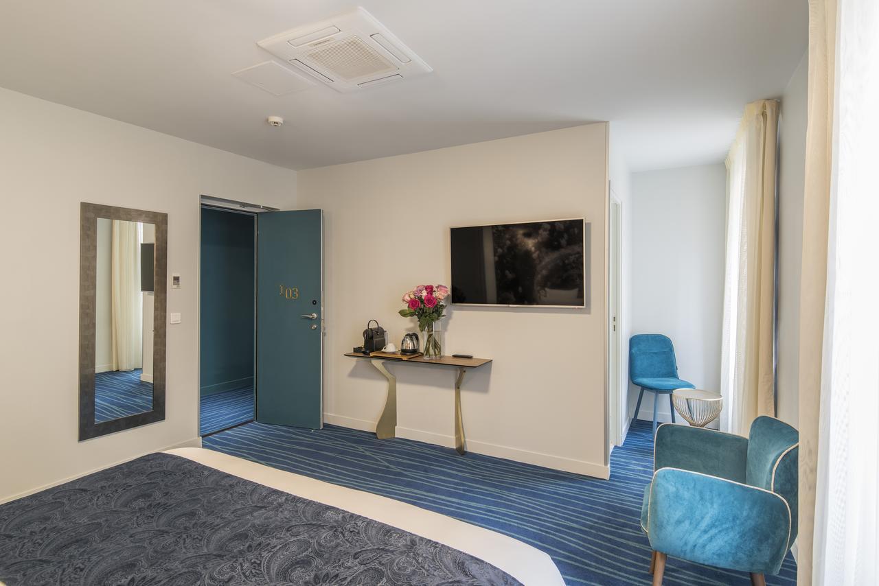 Hotel Mercure Paris Suresnes Longchamp Esterno foto