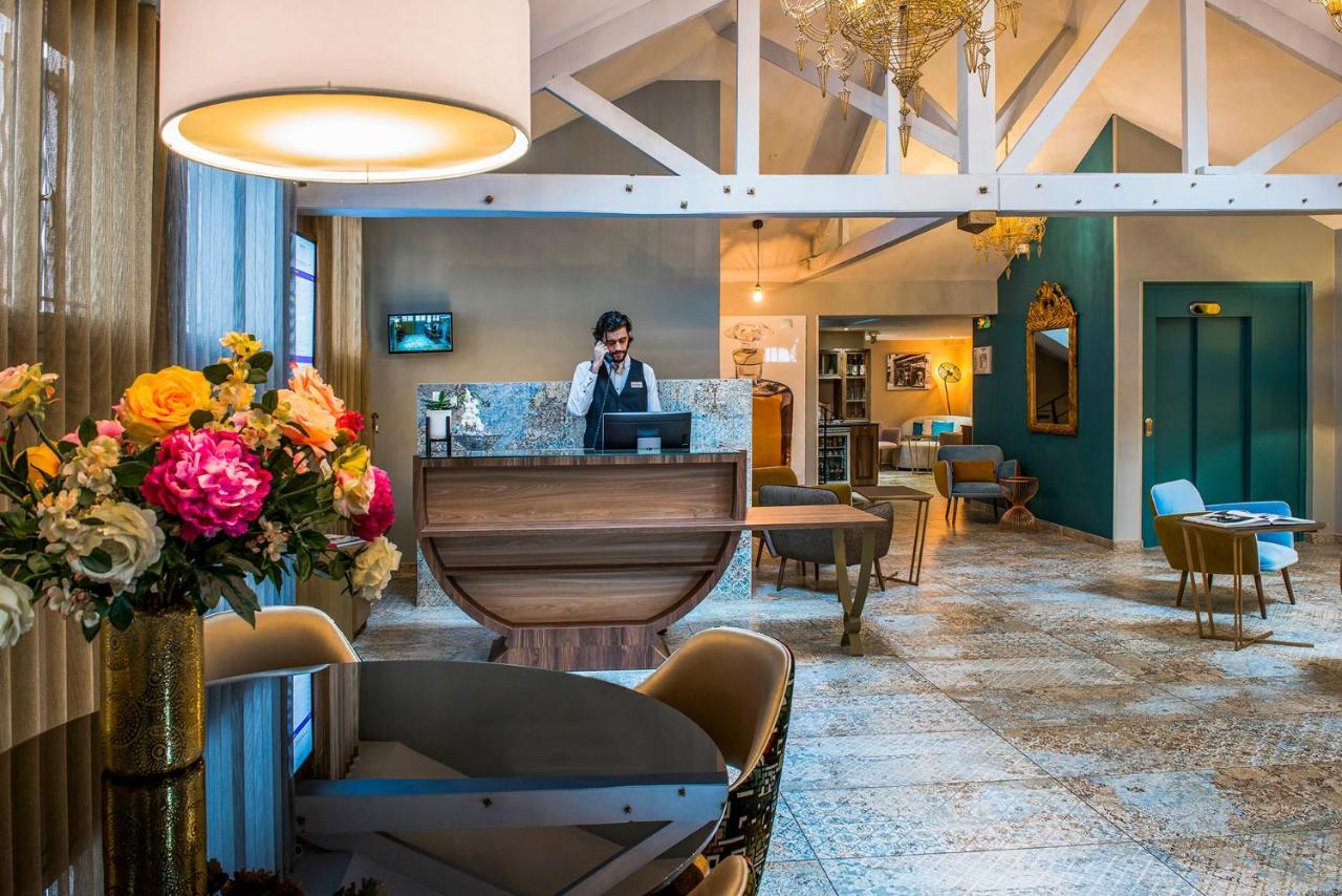 Hotel Mercure Paris Suresnes Longchamp Esterno foto