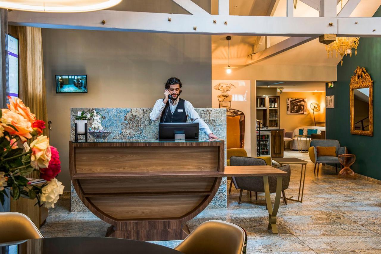 Hotel Mercure Paris Suresnes Longchamp Esterno foto