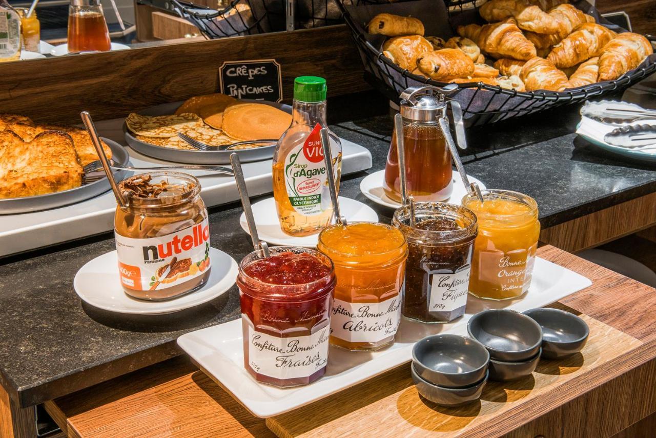 Hotel Mercure Paris Suresnes Longchamp Esterno foto